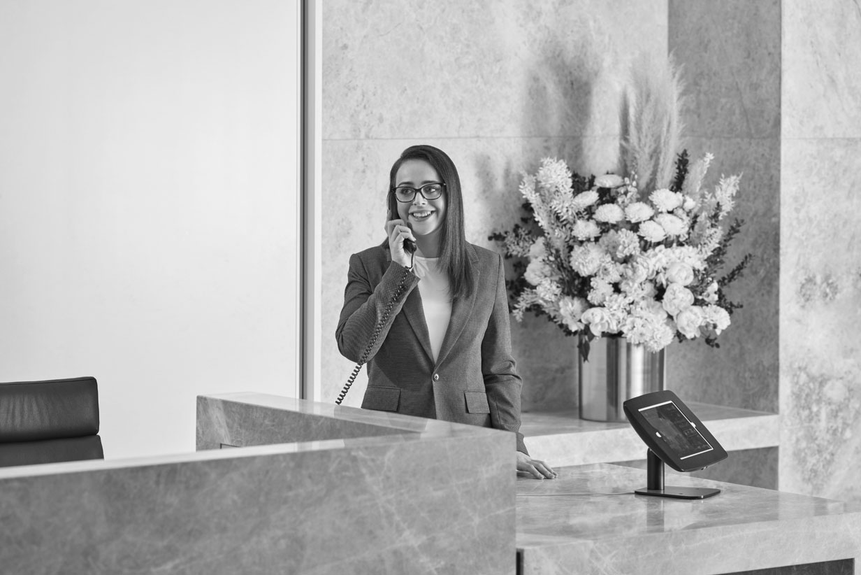 One Fell Swoop - concierge answering a phone call